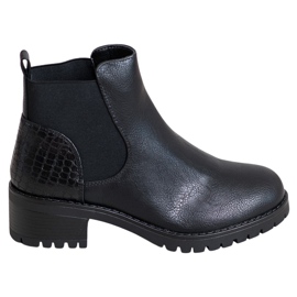 J. Star Botas sin cordones en un poste negro