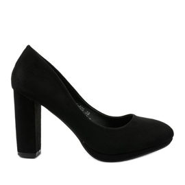 Zapatos de tacón de ante negro en el poste Recite