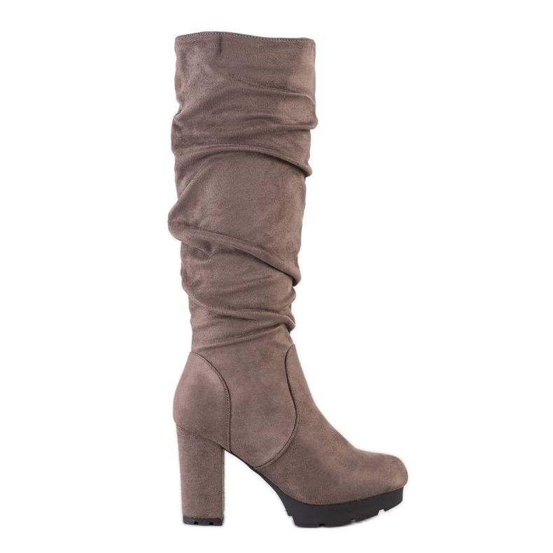 SHELOVET Botas beige en un pilar