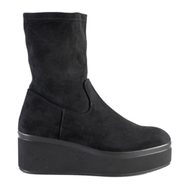 Botas en la plataforma Sergio Leone negro