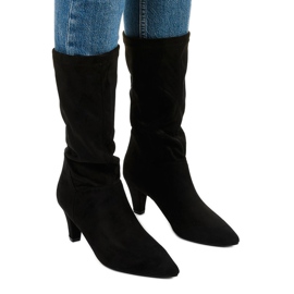 Botas negras sobre un tacón grueso de Fourmane negro