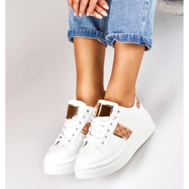 Zapatos deportivos de mujer blancos con estilo. 6