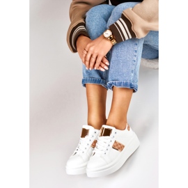 Zapatos deportivos de mujer blancos con estilo. 3