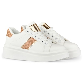 Zapatos deportivos de mujer blancos con estilo. 1