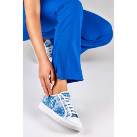 Deportivas blancas y azules de mujer 4