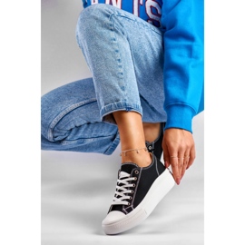 Zapatillas negras en una plataforma baja. negro 1