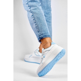 Deportivas de mujer blancas con complementos azules blanco 2
