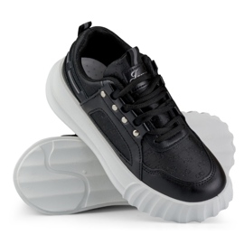Deportivas de mujer negras con suela blanca. negro 1