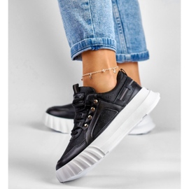 Deportivas de mujer negras con suela blanca. negro 6