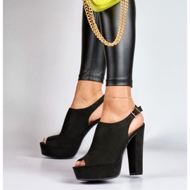 Sandalias negras de tacón con puntera y talón abiertos. negro 5
