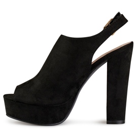Sandalias negras de tacón con puntera y talón abiertos. negro 2
