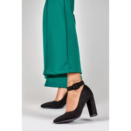 Zapatos de salón negros de mujer abrochados al tobillo 1