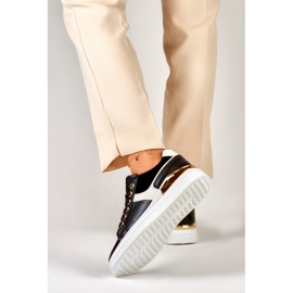 Zapatillas de mujer en blanco y negro en la plataforma Eliza. 5