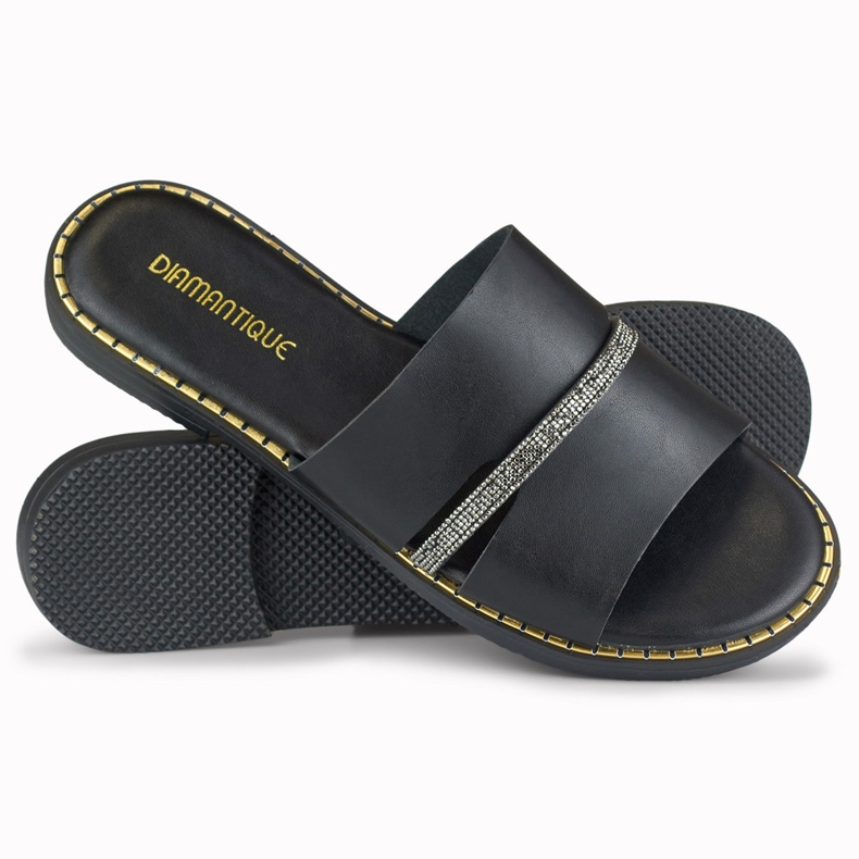 Elegantes zapatillas de mujer negras con adorno. negro 1