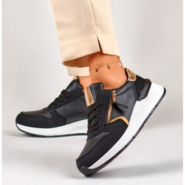 Deportivas de mujer negras con cremallera dorada. negro 6