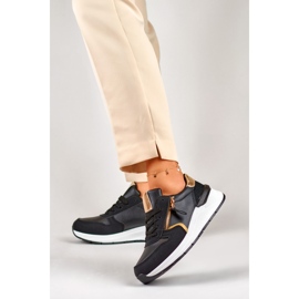 Deportivas de mujer negras con cremallera dorada. negro 5