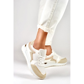 Zapatillas deportivas de mujer con detalle dorado. beige 2