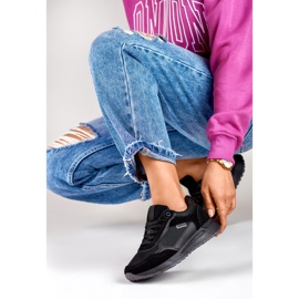 Deportivas negras de mujer con suela negra. negro 1