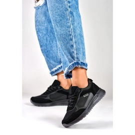 Deportivas negras de mujer con suela negra. negro 3