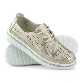 Deportivas doradas para mujer fabricadas en piel genuina dorado 5