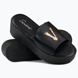 Sandalias mujer cuña negras con adorno dorado negro 1