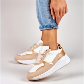 Deportivas blancas y doradas de mujer blanco 6