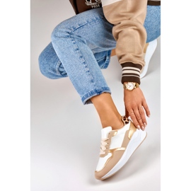 Deportivas blancas y doradas de mujer blanco 3