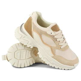 Zapatillas beige de mujer con suela blanca. 2