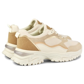 Zapatillas beige de mujer con suela blanca. 3