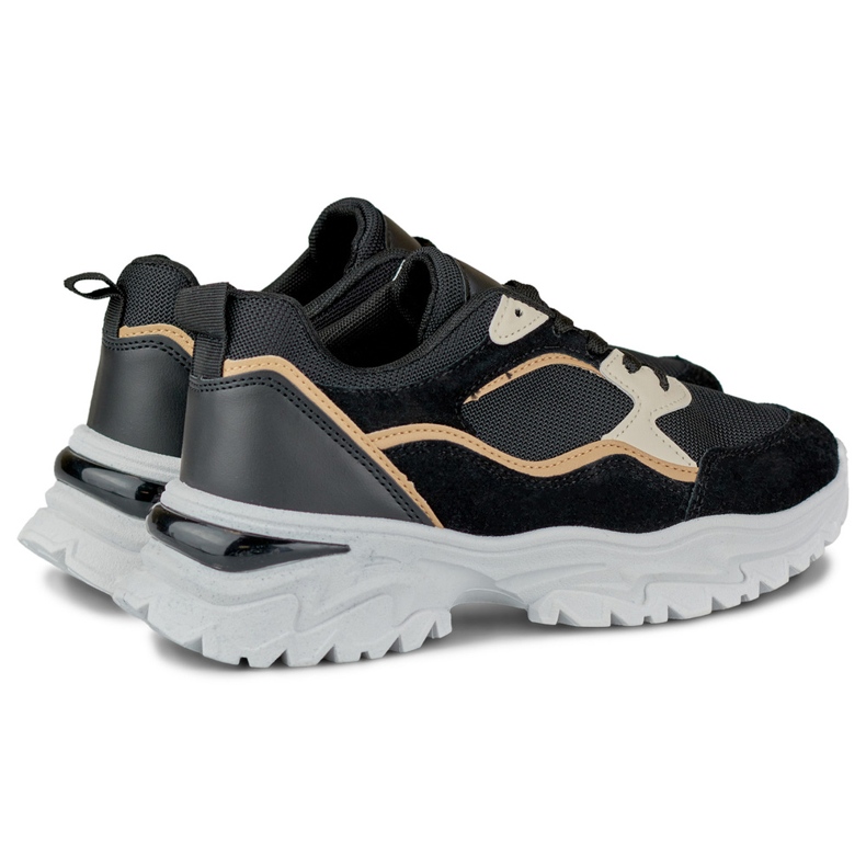 Zapatillas negras de mujer con suela blanca. negro 1