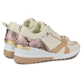 Zapatos beige de mujer con cordones y cuña baja 1