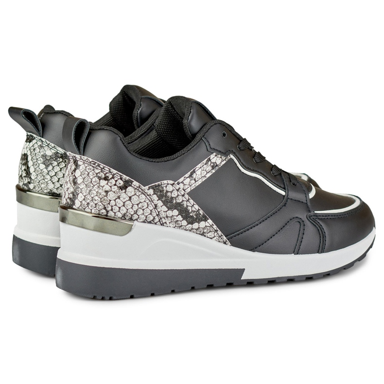 Zapatos de mujer negros con cordones y cuña baja 1