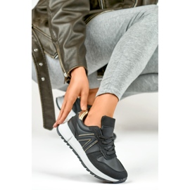 Deportivas negras de mujer con detalle dorado negro 1