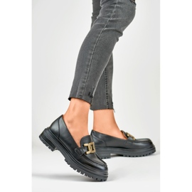 Mocasines negros con hebilla dorada 3