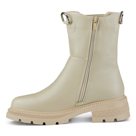 Botas clásicas de mujer beige en la plataforma. 2