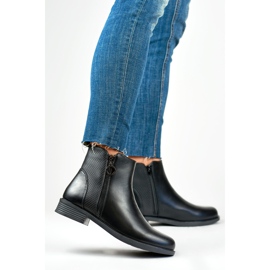 Botas planas de mujer negras fabricadas en ecopiel negro 3