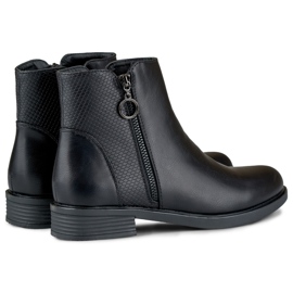 Botas planas de mujer negras fabricadas en ecopiel negro 1