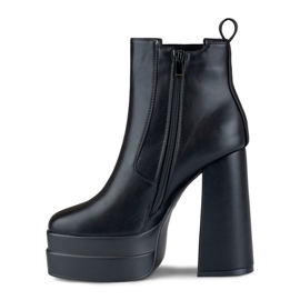 Botas negras en un poste alto y plataforma. negro 4
