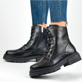 Botas negras con cordones para mujer fabricadas en piel natural. negro 6
