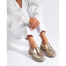 Mocasines dorados de mujer con suela gruesa de Shelovet 1