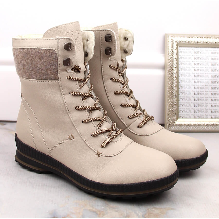 Botas de mujer cómodas de piel con aislamiento beige Rieker Z2405-60 -  KeeShoes