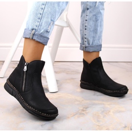Botas de mujer cómodas con aislamiento negro Rieker 73357-00 14