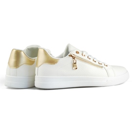 Deportivas blancas con cremallera dorada. blanco 1