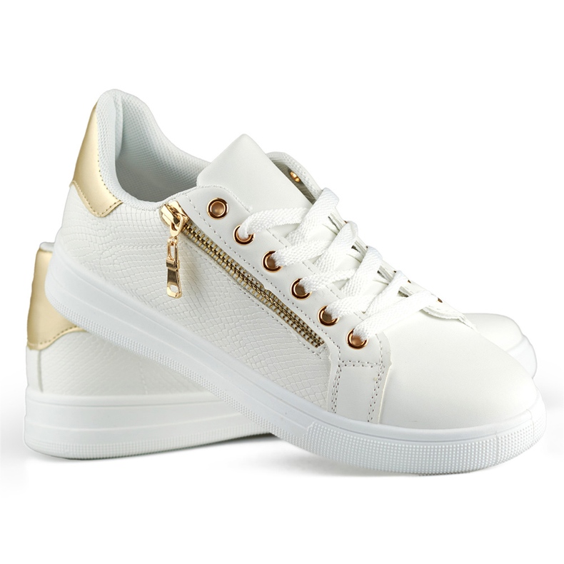 Deportivas blancas con cremallera dorada. blanco 2