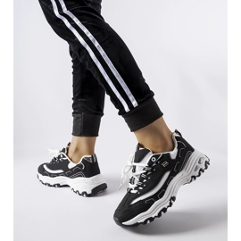 Zapatillas deportivas Kouri en blanco y negro. 1
