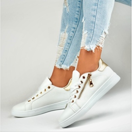 Deportivas blancas con cremallera dorada. blanco 7