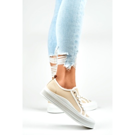 Zapatillas de mujer beige con suela blanca. 5