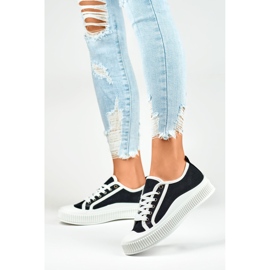 Zapatillas de mujer negras con suela blanca. negro 2