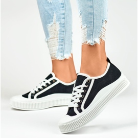 Zapatillas de mujer negras con suela blanca. negro 6