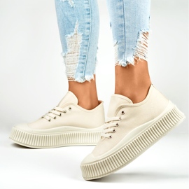 Zapatillas de mujer beige claro con suela gruesa. 6